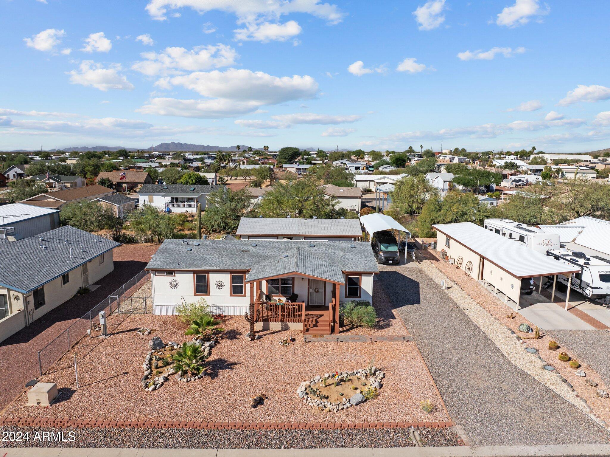 30854 Wandering Way Congress, AZ 85332 - Photo 38 of 43 an aerial view of a house with a big yard