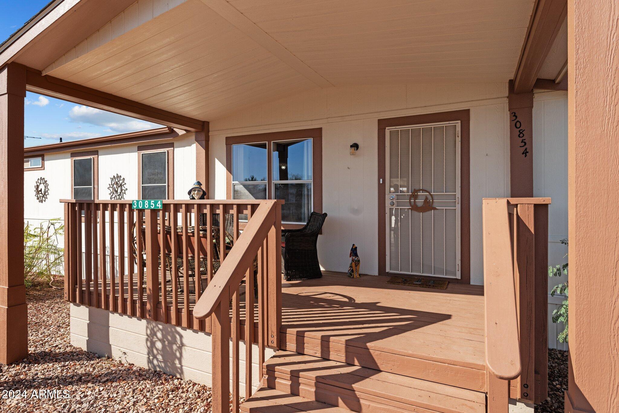 30854 Wandering Way Congress, AZ 85332 - Photo 4 of 43 a view of a balcony with furniture