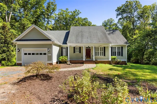 a view of a room with furniture window and wooden floor