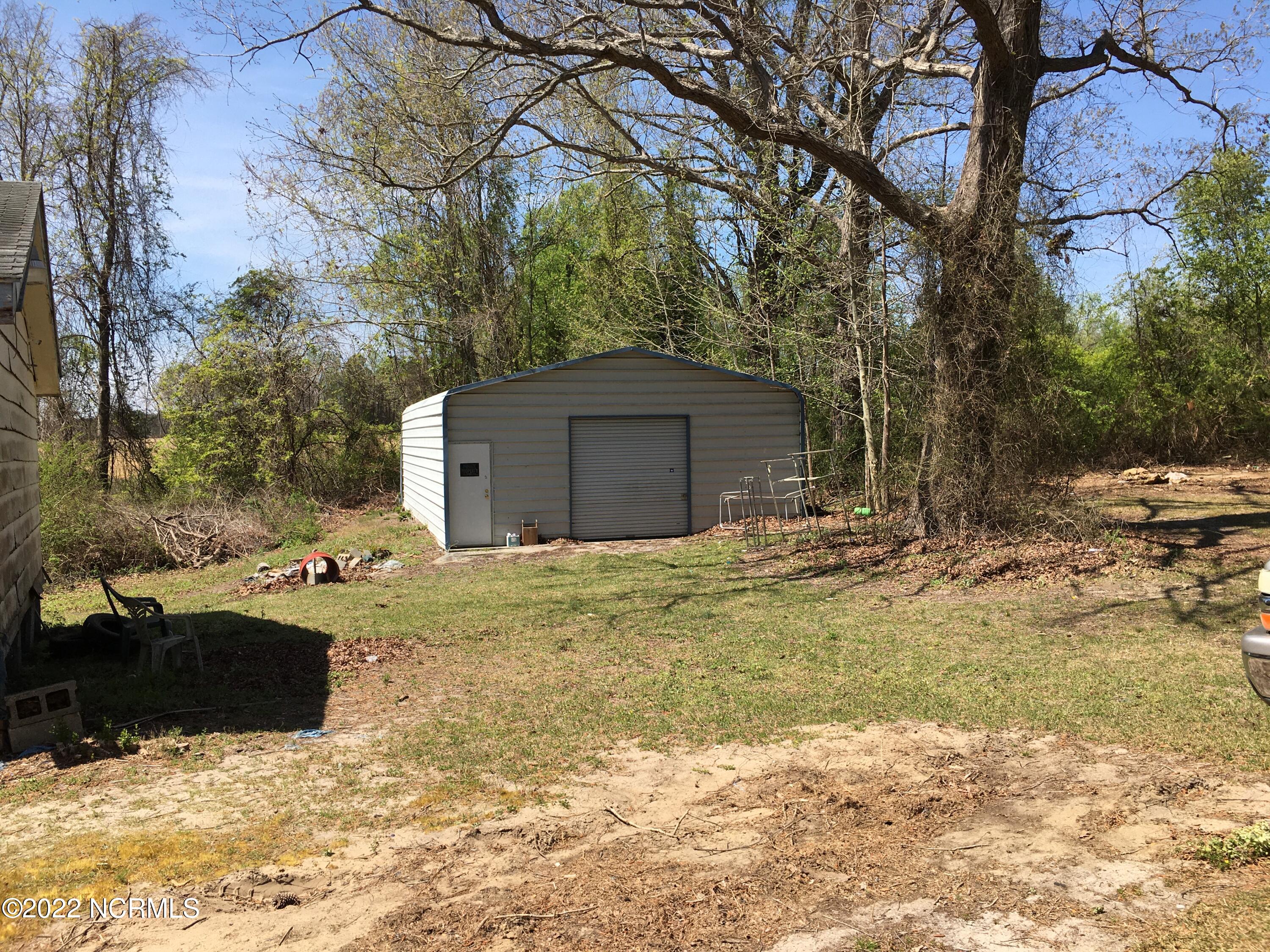 6651 Pine Ridge Road Faison, NC 28341 - Photo 18 of 19 Metal storage building 24 x 30
