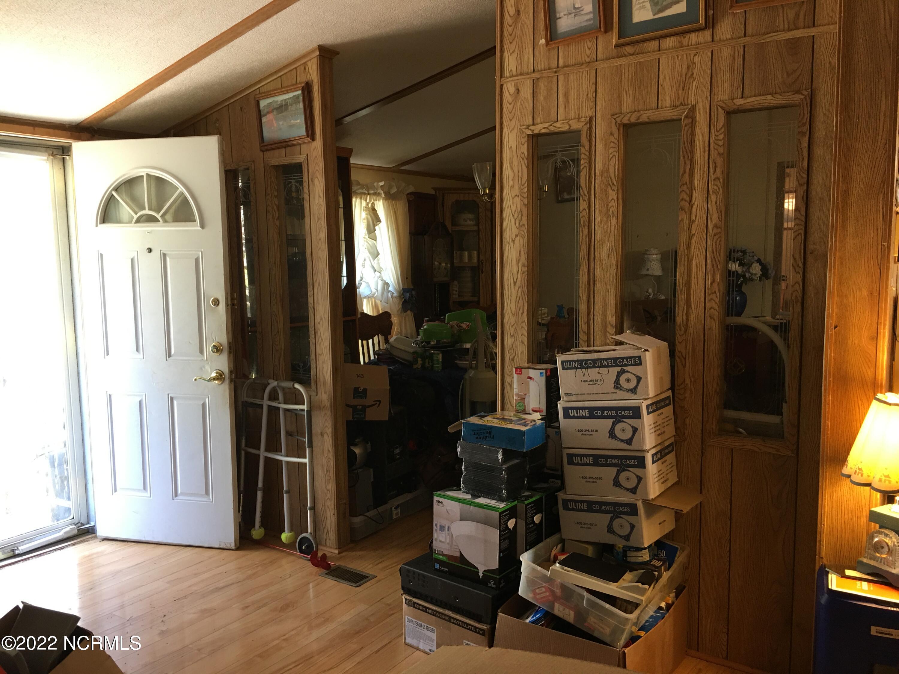 6651 Pine Ridge Road Faison, NC 28341 - Photo 2 of 19 Living room looking at front door