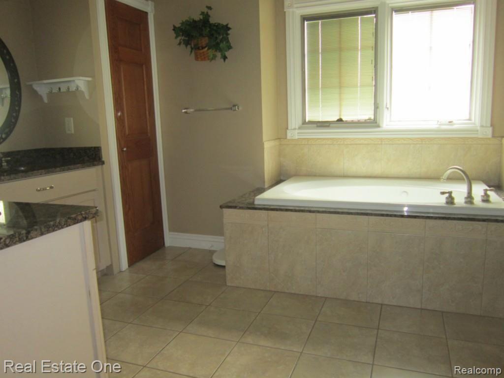 12230 Sweitzer Road Carleton, MI 48117 - Photo 18 of 33 sweitzie master bathie.jpg