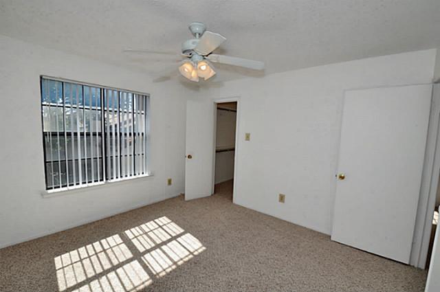 5630 Spring Valley Road, Unit 18C Dallas, TX 75254 - Photo 11 of 20 a view of an empty room with a window