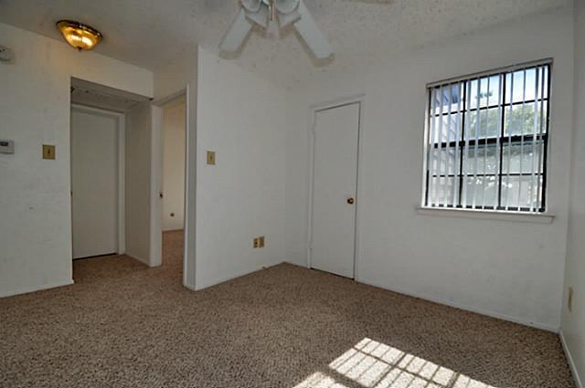 5630 Spring Valley Road, Unit 18C Dallas, TX 75254 - Photo 14 of 20 a view of empty room with window
