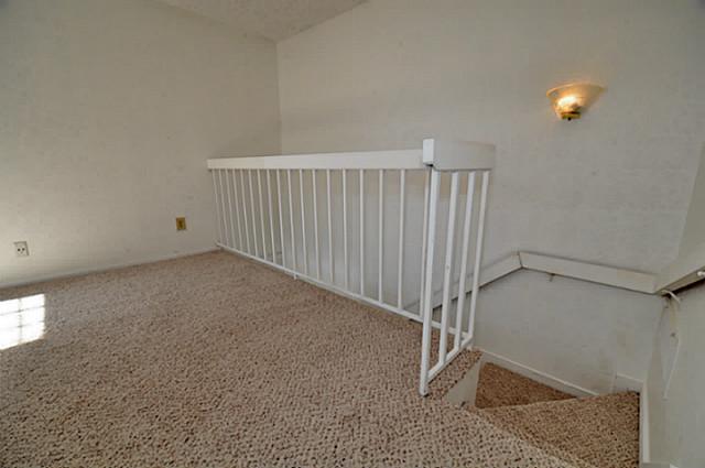 5630 Spring Valley Road, Unit 18C Dallas, TX 75254 - Photo 16 of 20 a view of a garage