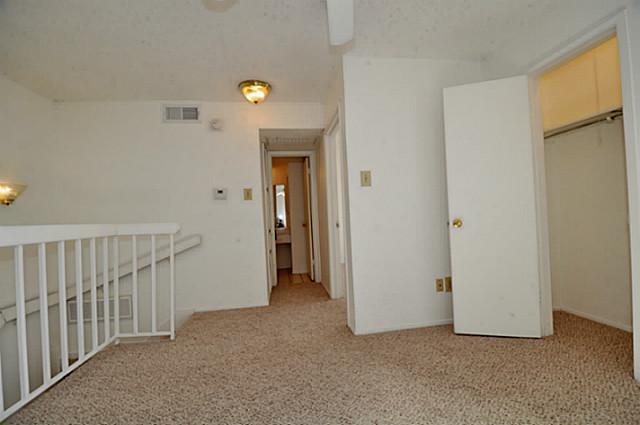 5630 Spring Valley Road, Unit 18C Dallas, TX 75254 - Photo 17 of 20 a view of an empty room