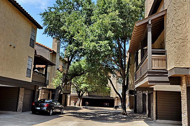 5630 Spring Valley Road, Unit 18C Dallas, TX 75254 - Photo 3 of 20 a view of a street in front of a building