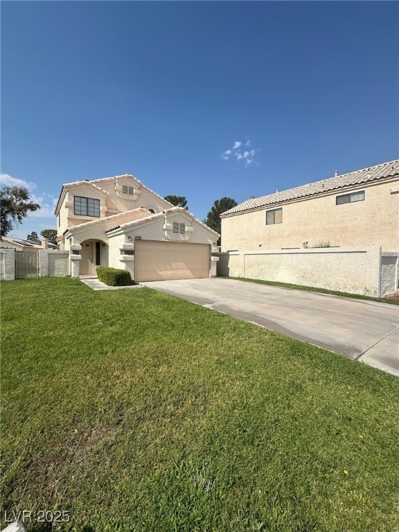 View of side of home featuring stucco siding, concrete driveway, and a tile roof