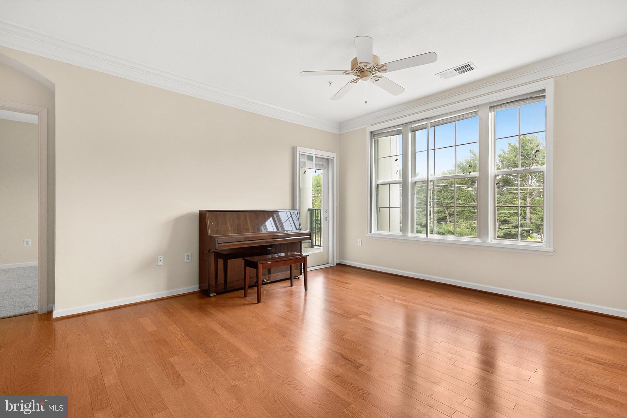 7 Granite Place, Unit 316 Gaithersburg, MD 20878 - Photo 13 of 84 a view of room with window and wooden floor