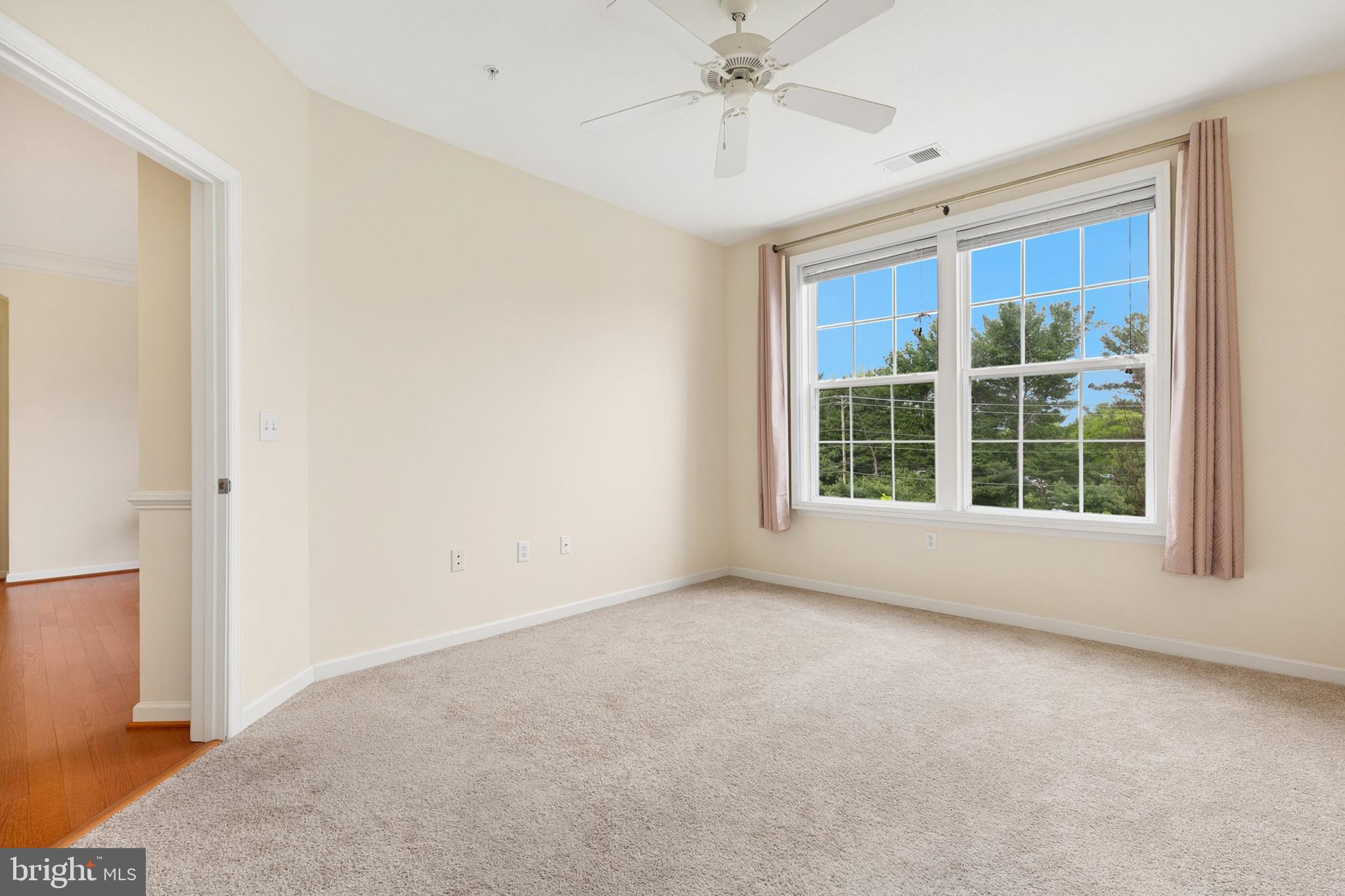 7 Granite Place, Unit 316 Gaithersburg, MD 20878 - Photo 16 of 84 a view of an empty room with a window