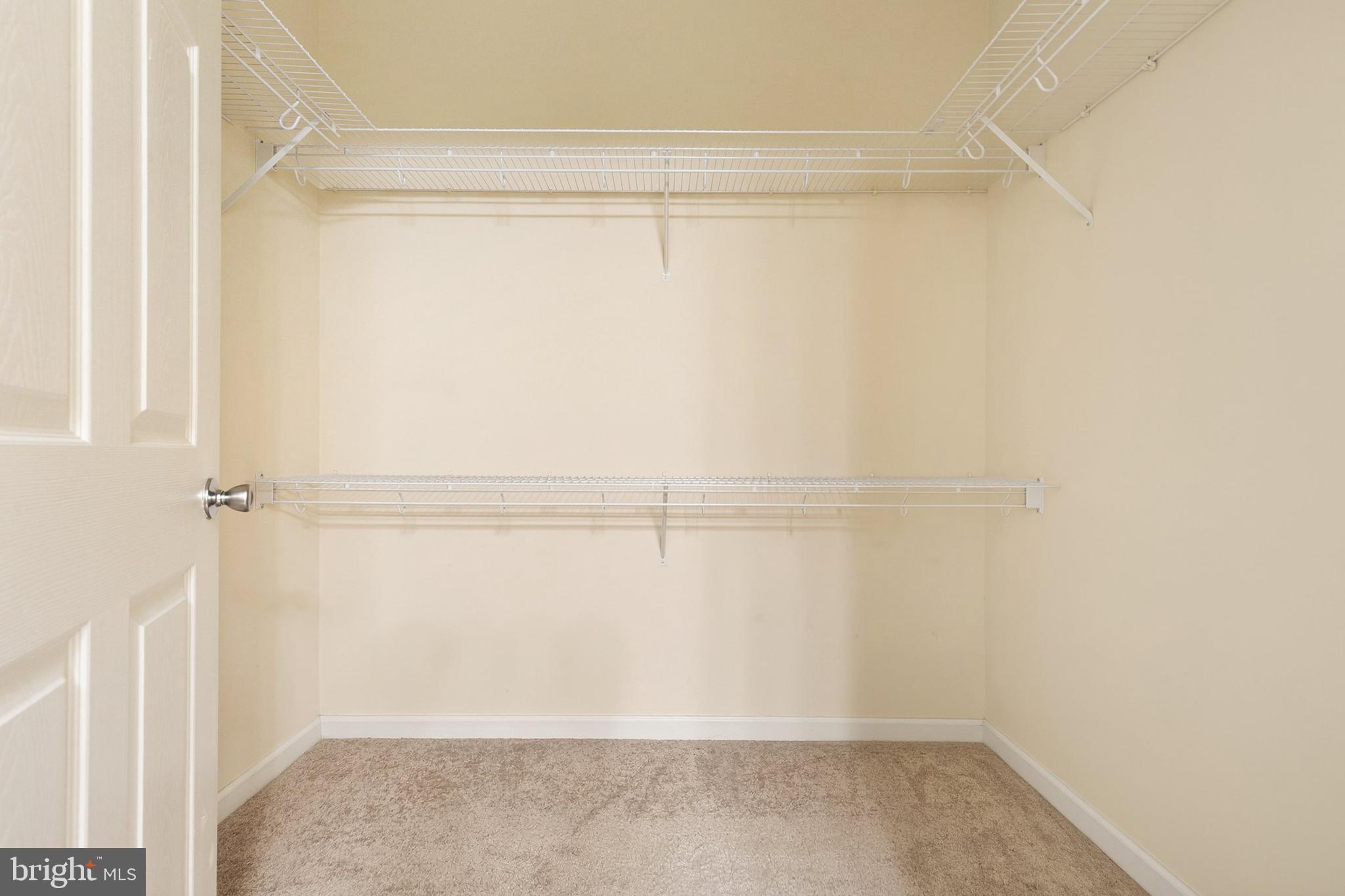 7 Granite Place, Unit 316 Gaithersburg, MD 20878 - Photo 21 of 84 a view of a room with racks on the wall