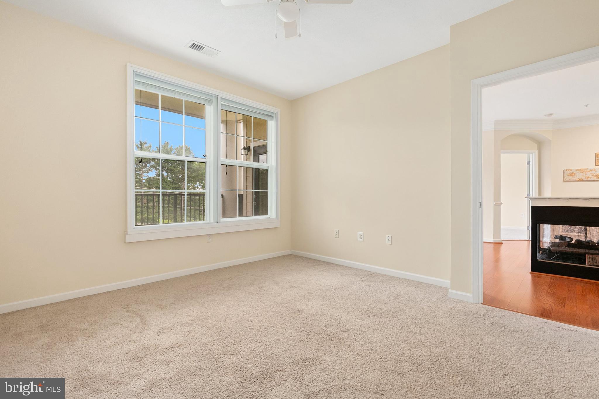 7 Granite Place, Unit 316 Gaithersburg, MD 20878 - Photo 22 of 84 a view of an empty room with a window