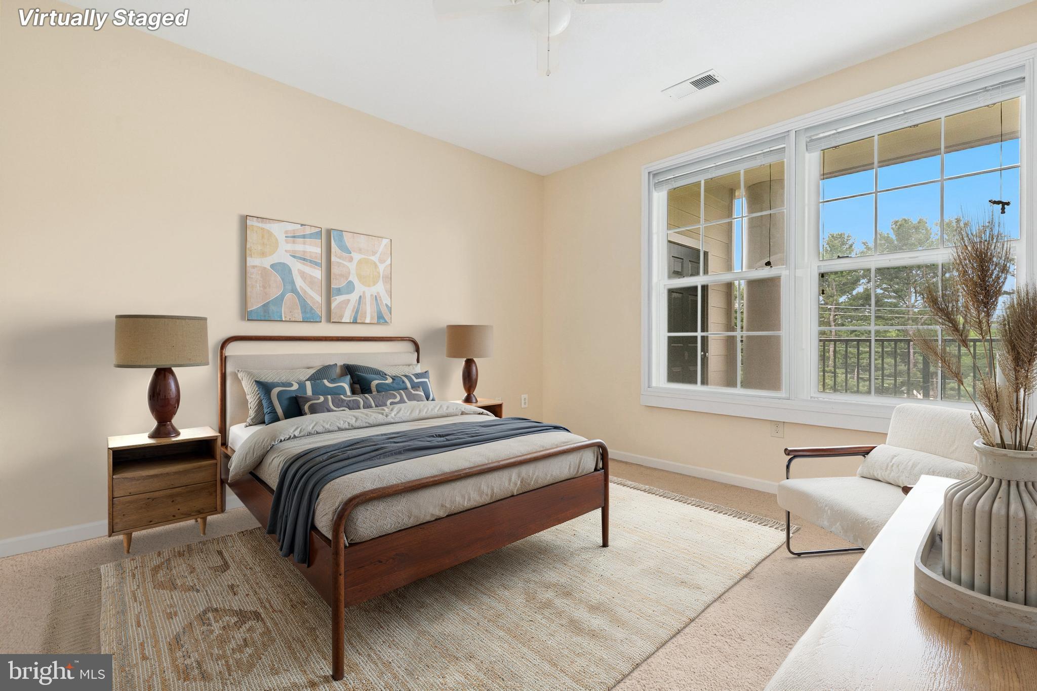7 Granite Place, Unit 316 Gaithersburg, MD 20878 - Photo 23 of 84 a bedroom with a bed and a large window