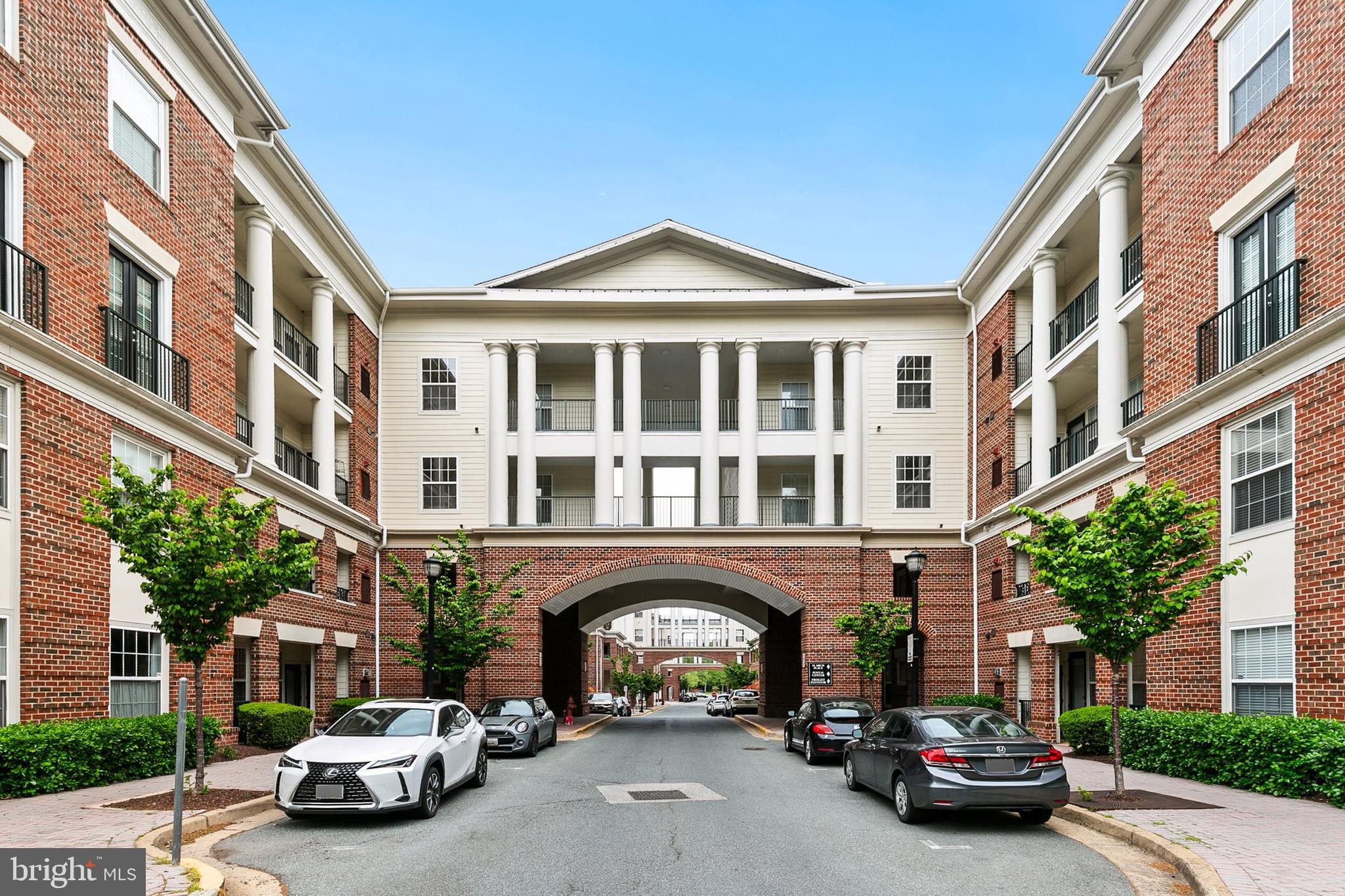 7 Granite Place, Unit 316 Gaithersburg, MD 20878 - Photo 56 of 84 a view of parking building and car parked in front of it