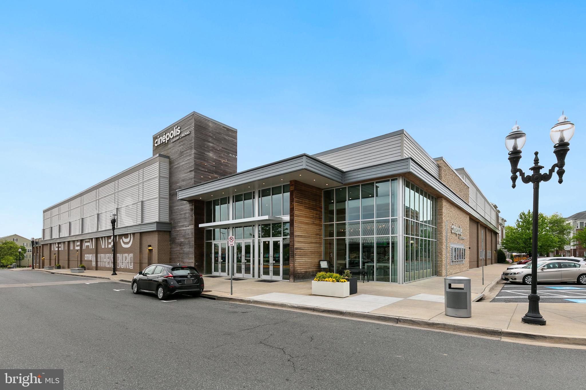 7 Granite Place, Unit 316 Gaithersburg, MD 20878 - Photo 61 of 84 a view of a building with a balcony and parking space