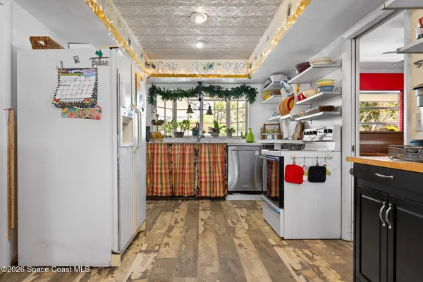 a utility room with washer and dryer