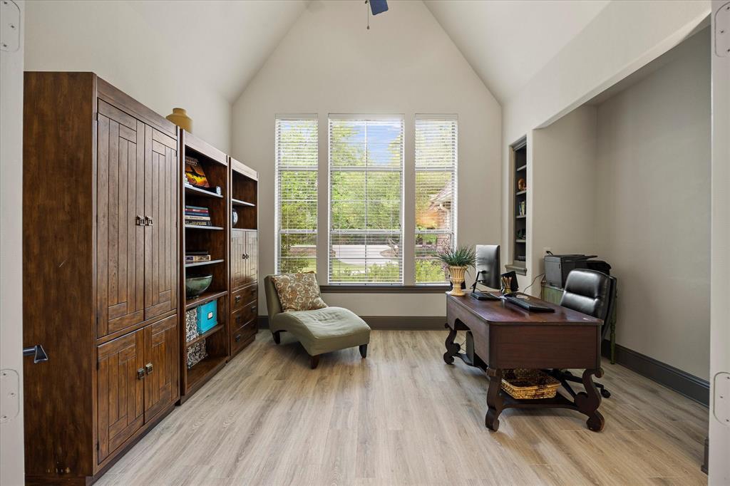 1704 White Road Heath, TX 75032 - Photo 12 of 28 a living room with furniture and a window
