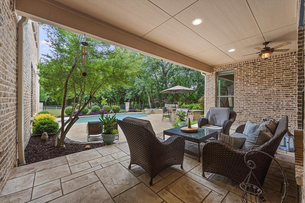 1704 White Road Heath, TX 75032 - Photo 13 of 28 a outdoor living space with furniture and garden view