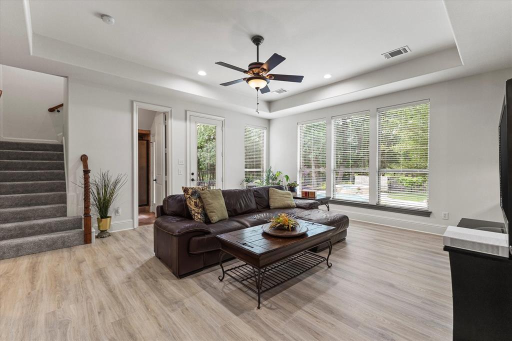 1704 White Road Heath, TX 75032 - Photo 25 of 28 a living room with furniture and a large window