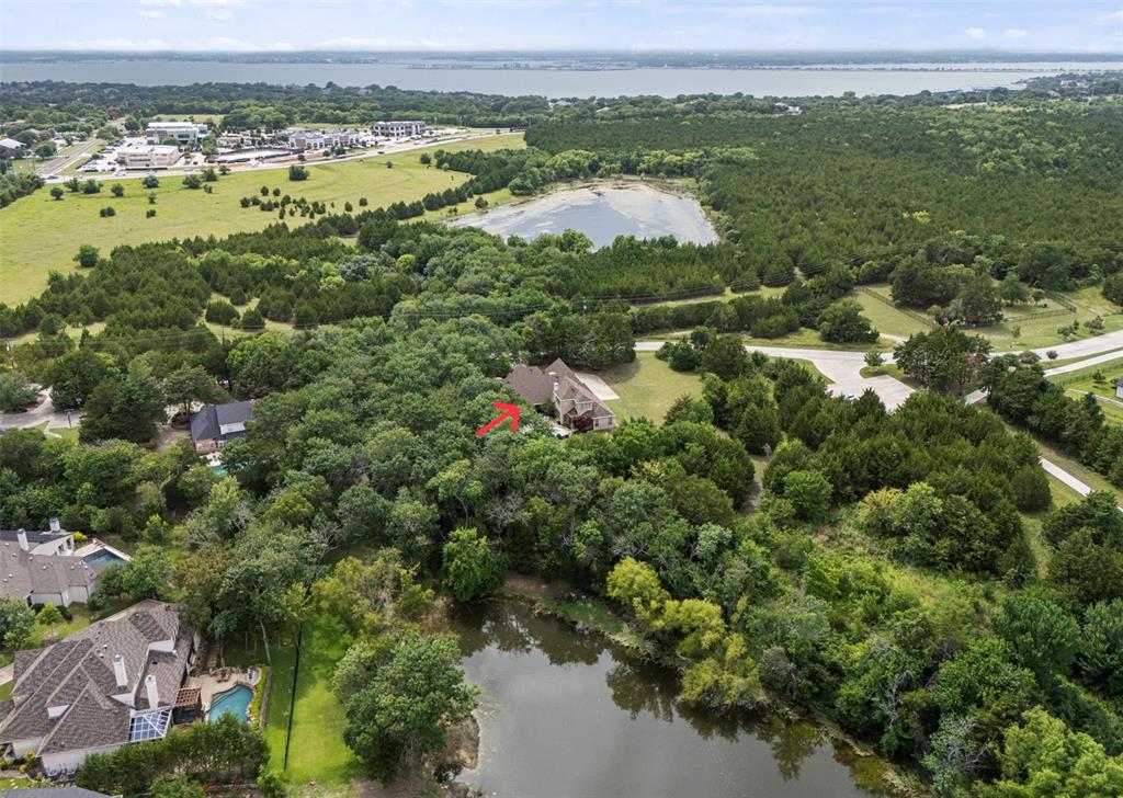 1704 White Road Heath, TX 75032 - Photo 5 of 28 an aerial view of a houses with a yard