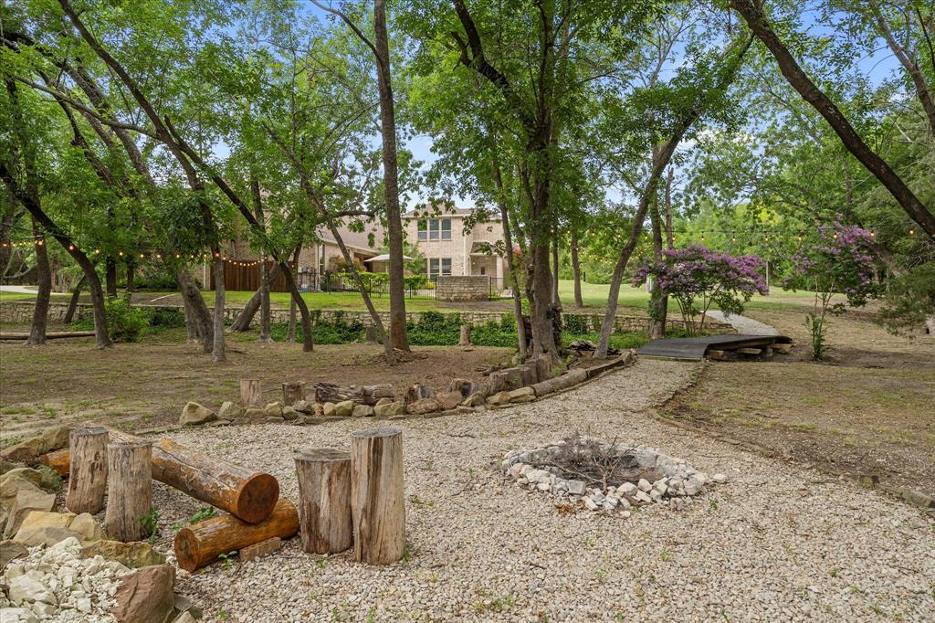 1704 White Road Heath, TX 75032 - Photo 6 of 28 a view of a park with large trees