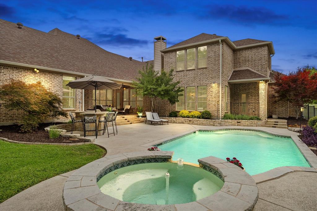 1704 White Road Heath, TX 75032 - Photo 7 of 28 a view of a house with swimming pool and sitting area