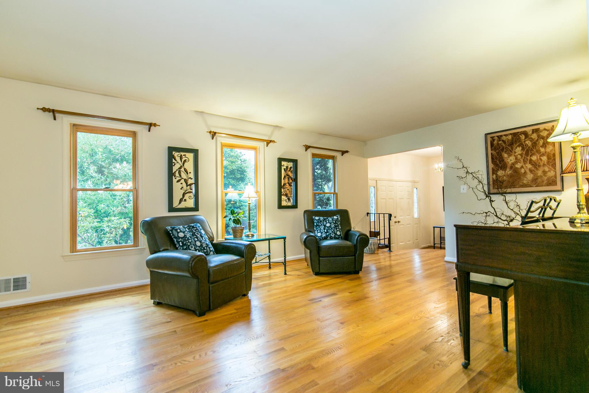 8000 West Point Drive Springfield, VA 22153 - Photo 7 of 30 Living Room with Hardwood & Lots of Natural Light