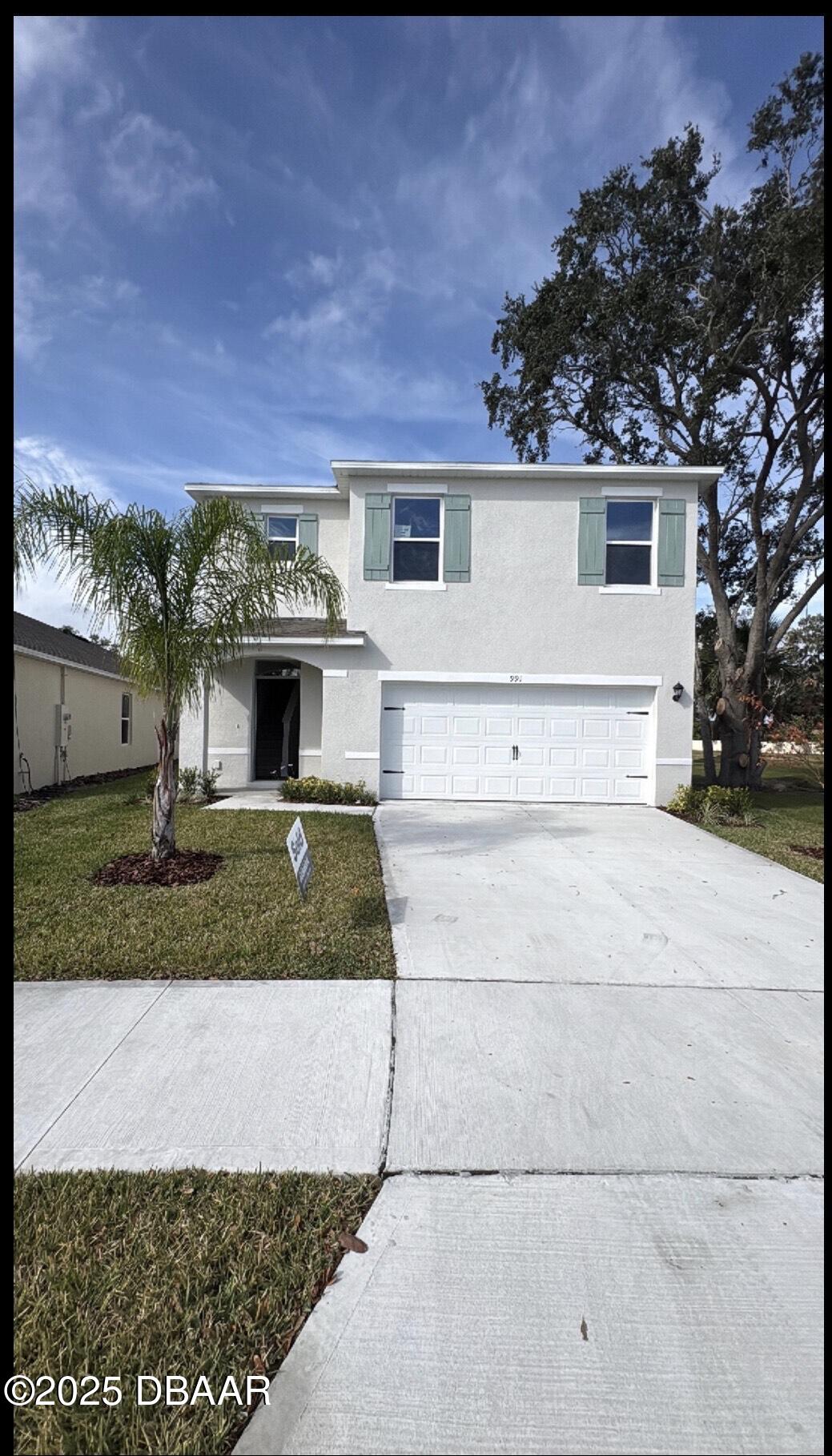 991 Commons Way Port Port Orange, FL 32129 - Photo 1 of 1 front view of a house with a yard