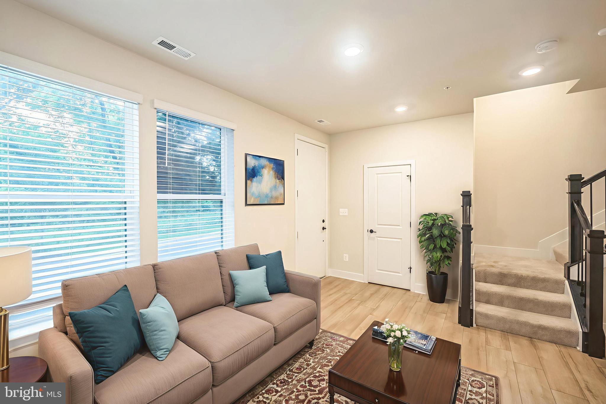 4402 Roland Heights Avenue Baltimore, MD 21211 - Photo 2 of 47 a living room with furniture and wooden floor