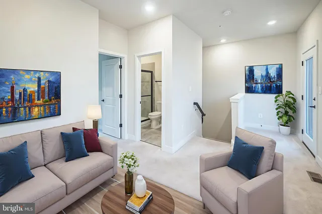 a living room with furniture and a couch