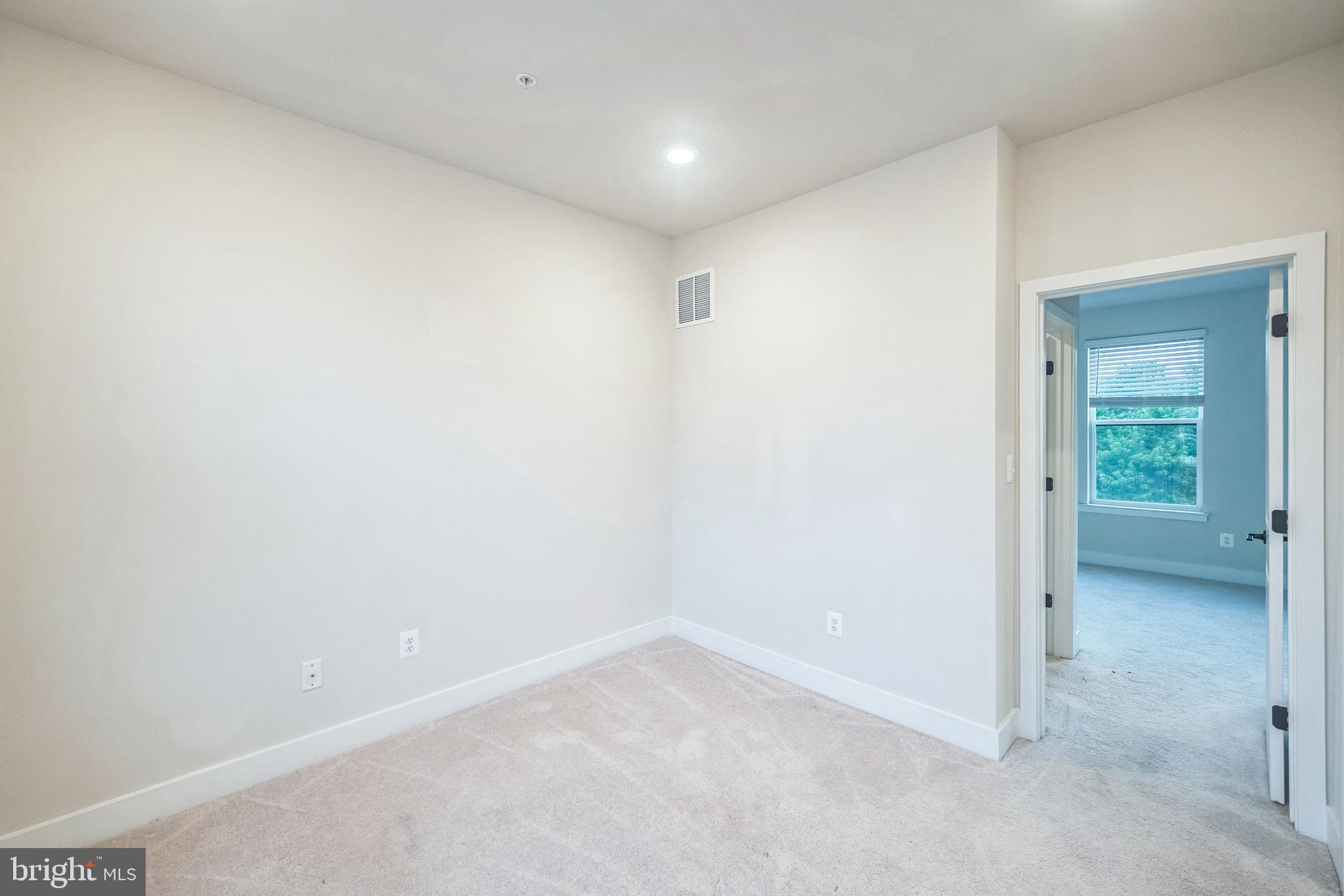 4402 Roland Heights Avenue Baltimore, MD 21211 - Photo 35 of 47 a view of an empty room