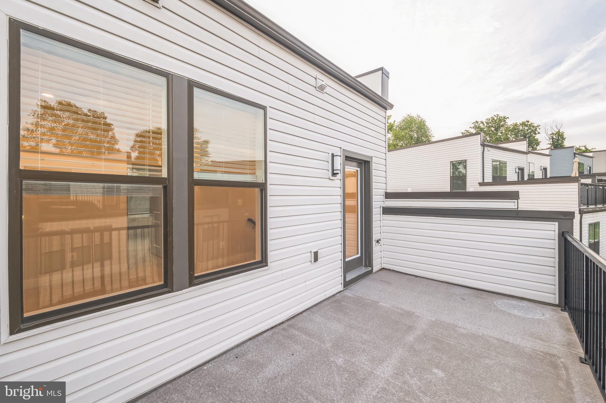 4402 Roland Heights Avenue Baltimore, MD 21211 - Photo 44 of 47 a view of a house with a large window
