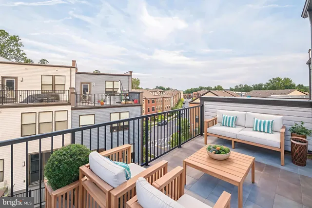 a view of a balcony with city view