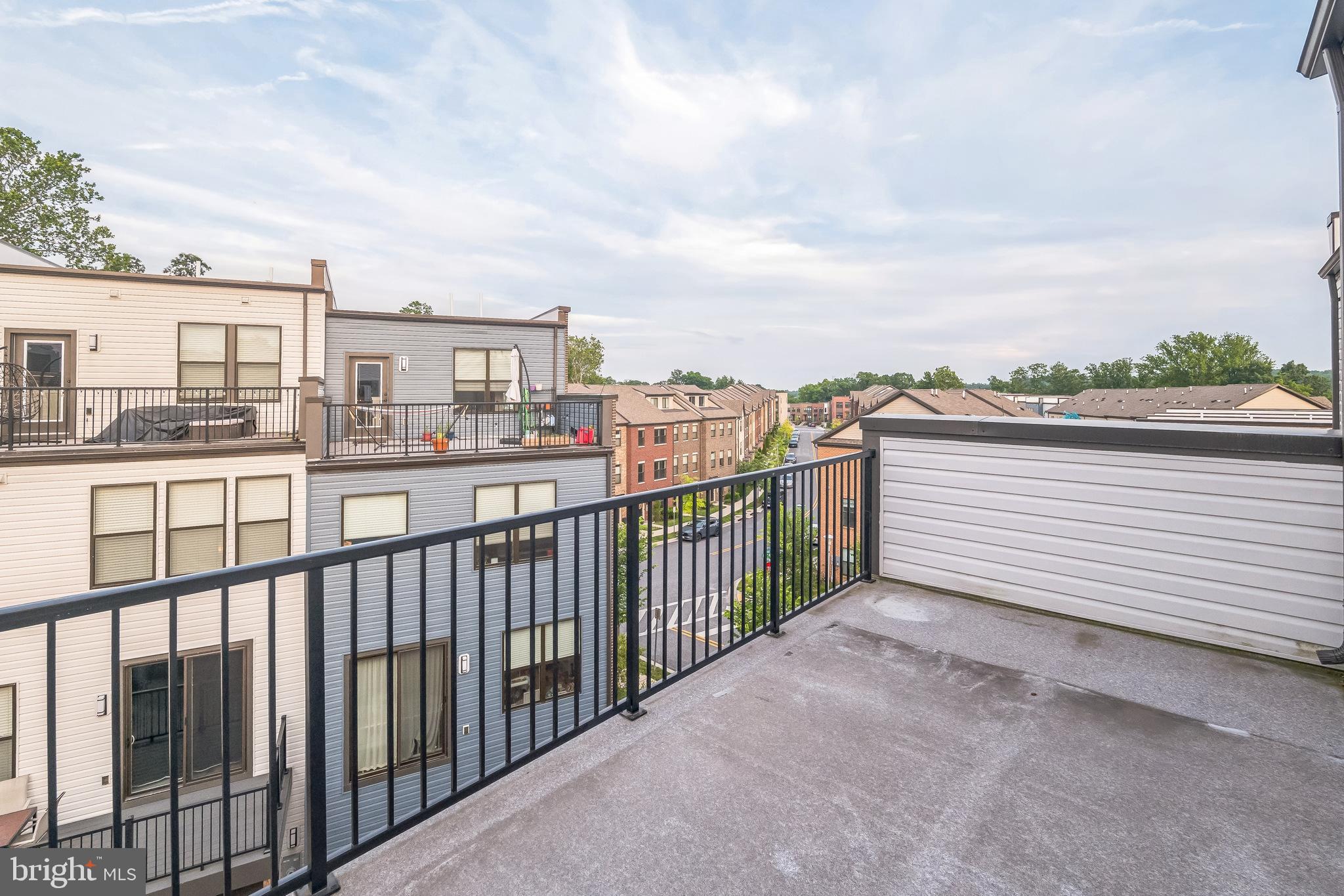4402 Roland Heights Avenue Baltimore, MD 21211 - Photo 46 of 47 a view of a balcony with city view