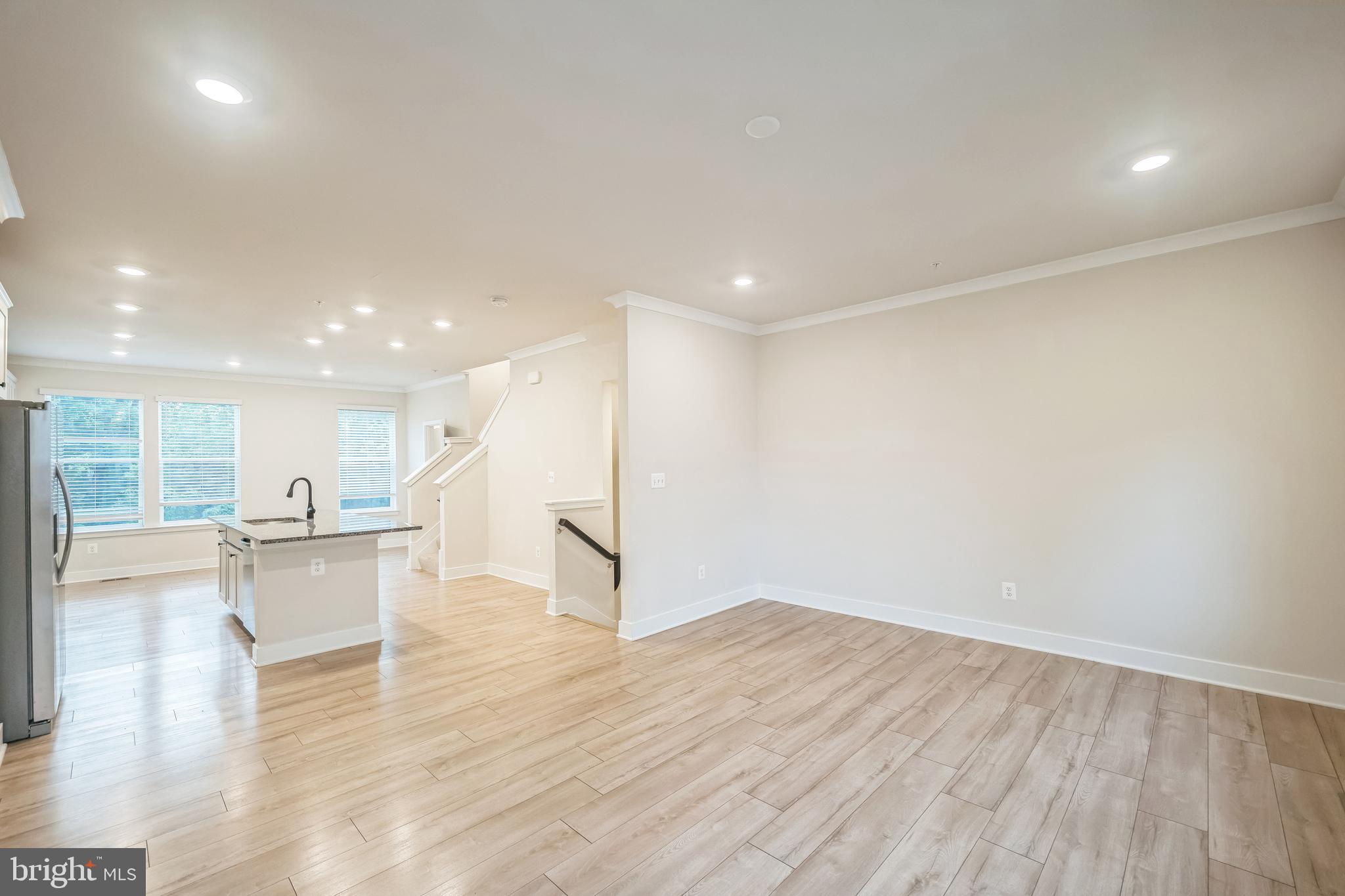 4402 Roland Heights Avenue Baltimore, MD 21211 - Photo 7 of 47 a view of kitchen with cabinets and wooden floor
