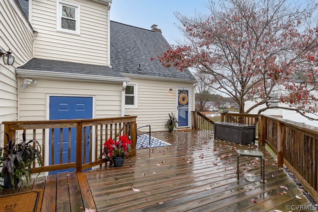 8117 Valencia Road Chesterfield, VA 23832 - Photo 27 of 30 a view of a house with wooden deck and furniture
