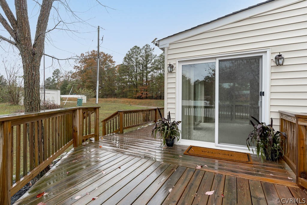 8117 Valencia Road Chesterfield, VA 23832 - Photo 28 of 30 a view of a balcony with floor to ceiling window wooden floor and wooden fence