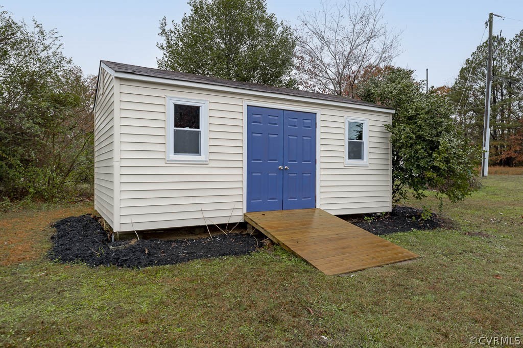 8117 Valencia Road Chesterfield, VA 23832 - Photo 29 of 30 a view of a house with a yard