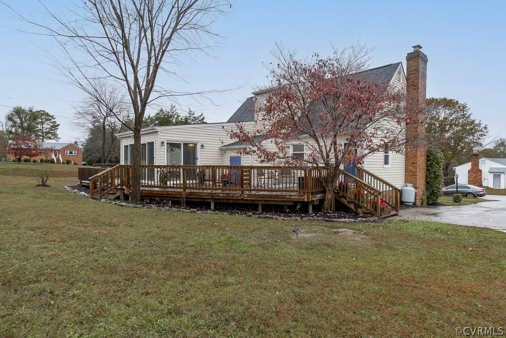 8117 Valencia Road Chesterfield, VA 23832 - Photo 30 of 30 a view of a house with a back yard