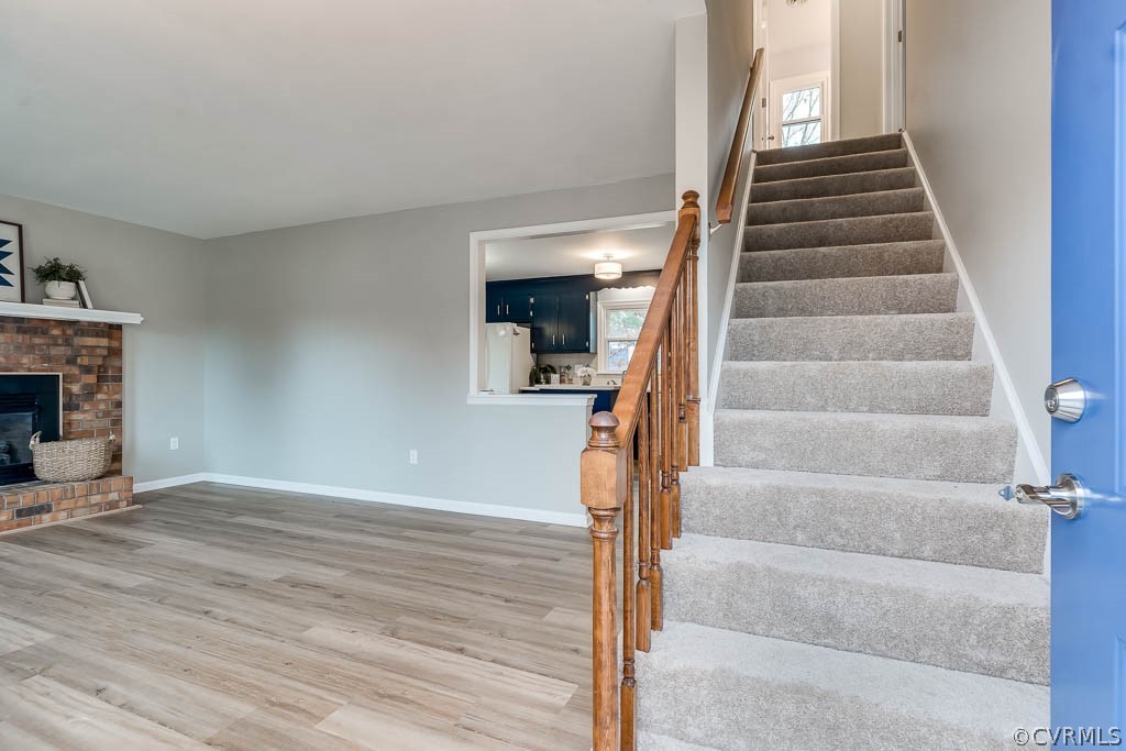 8117 Valencia Road Chesterfield, VA 23832 - Photo 4 of 30 a view of entryway and hall with wooden floor