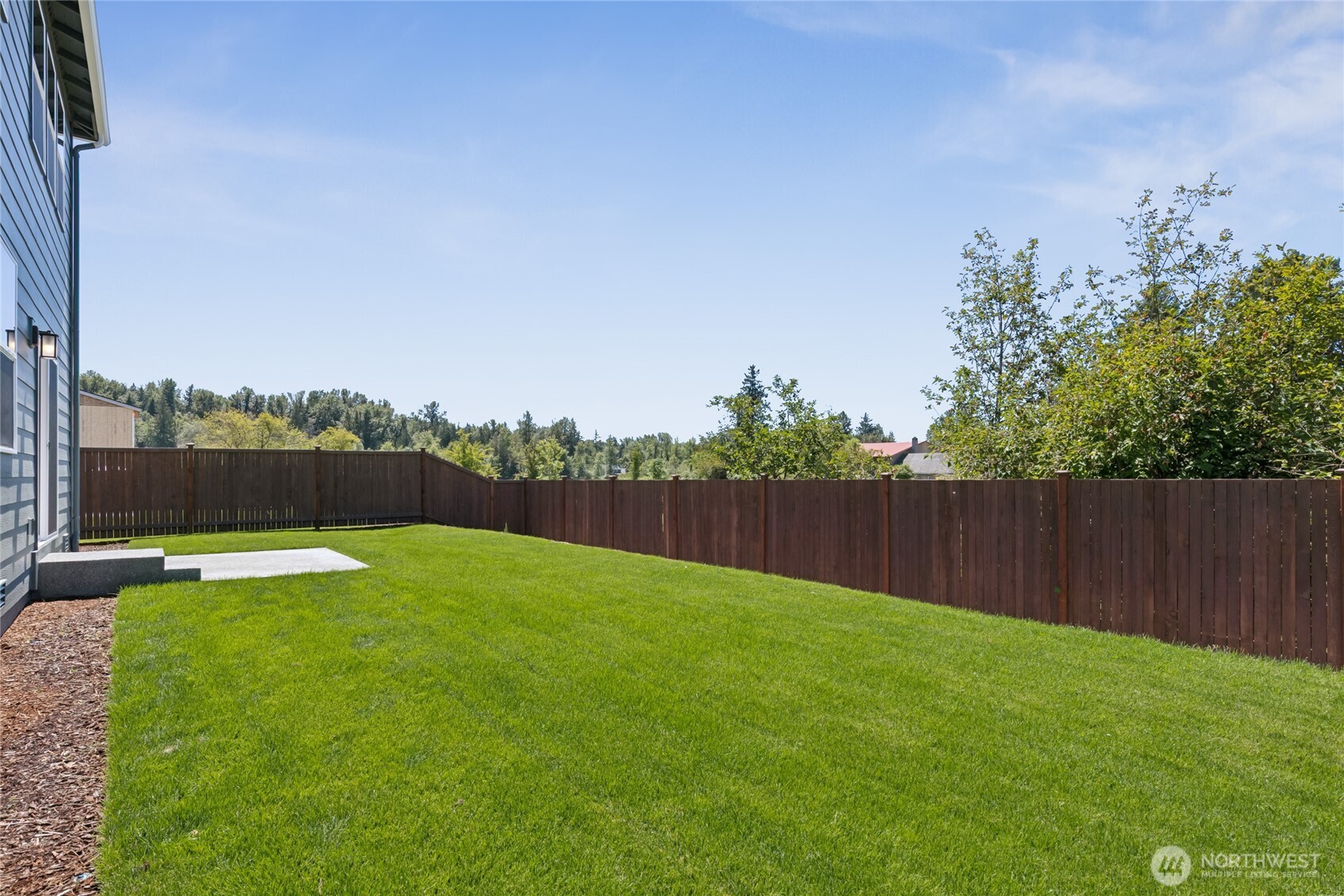 563 Hann Street, Unit 9 Buckley, WA 98321 - Photo 34 of 37 a view of swimming pool with a yard