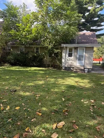 a view of a house with a big yard