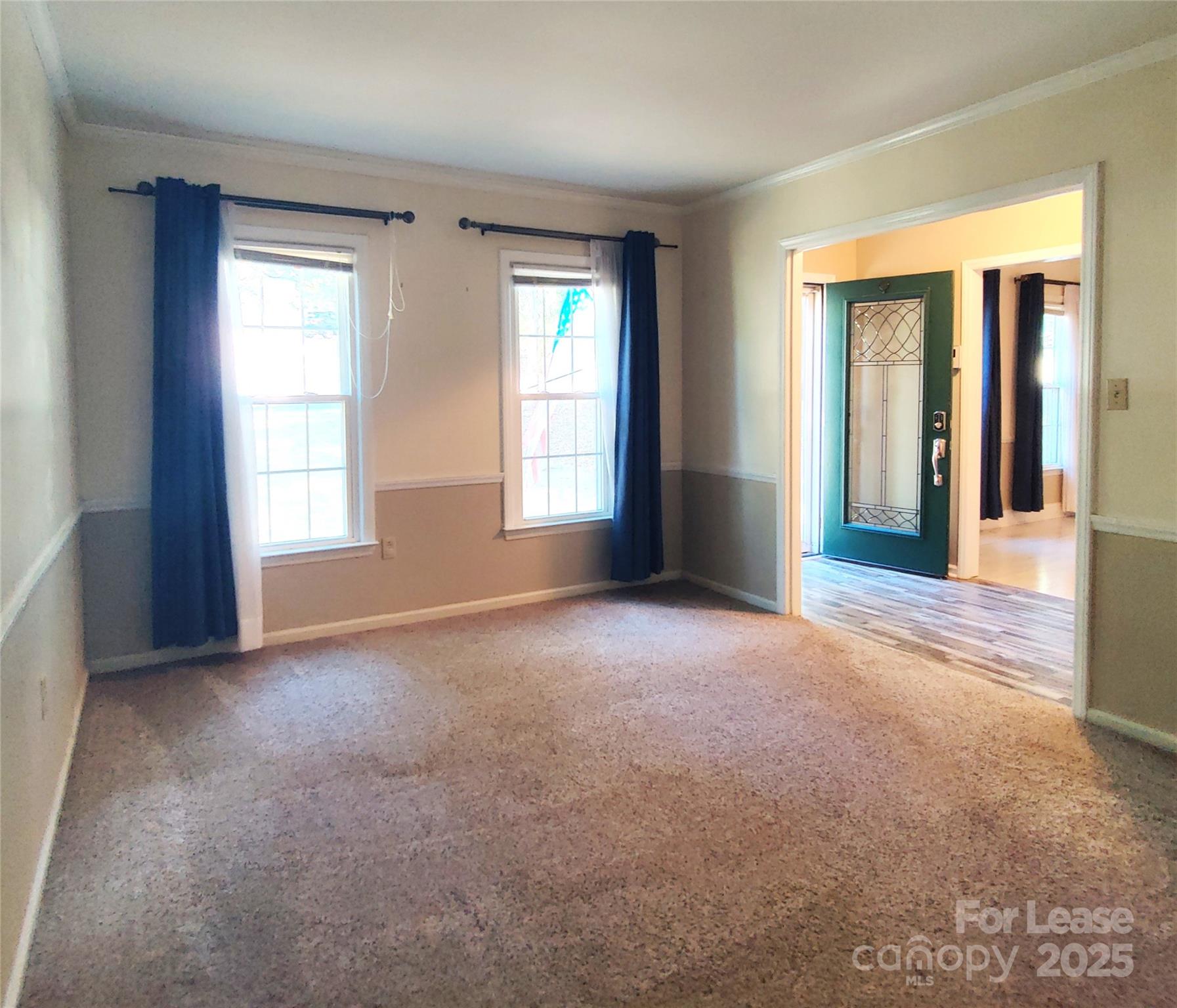 8644 Kirchenbaum Drive Charlotte, NC 28210 - Photo 17 of 28 an empty room with windows