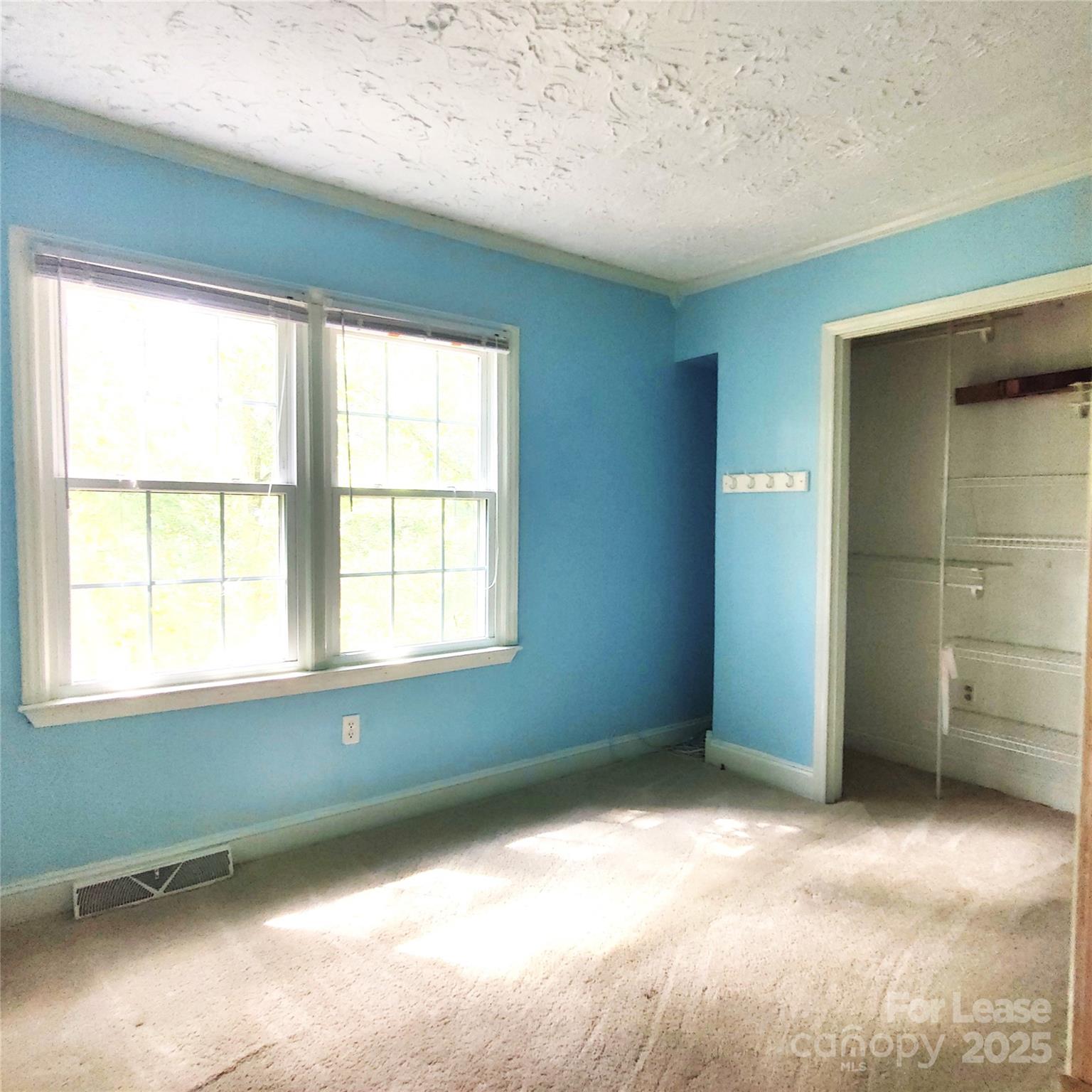 8644 Kirchenbaum Drive Charlotte, NC 28210 - Photo 23 of 28 a view of an empty room with a window