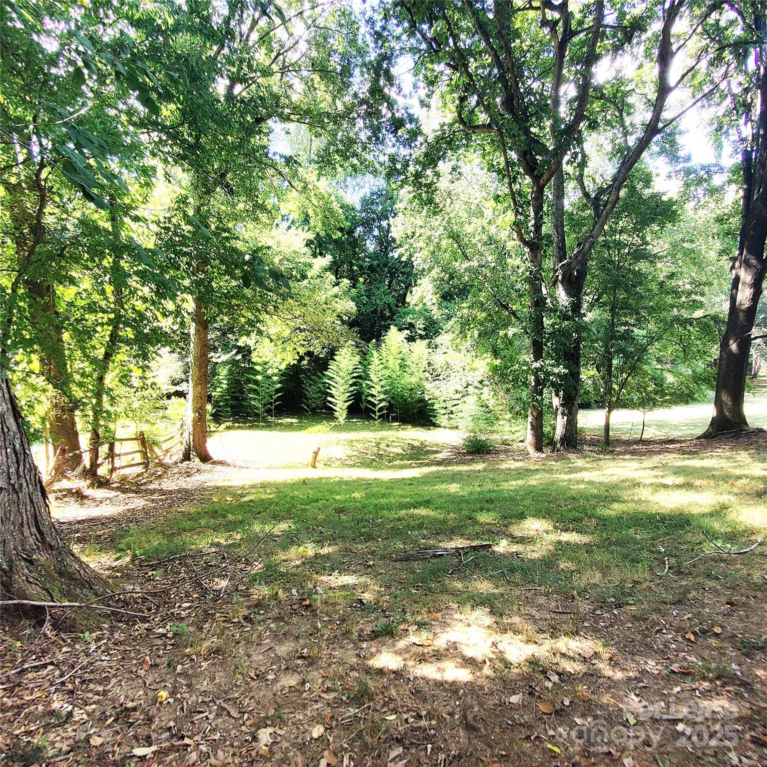 8644 Kirchenbaum Drive Charlotte, NC 28210 - Photo 26 of 28 a view of a yard with a tree