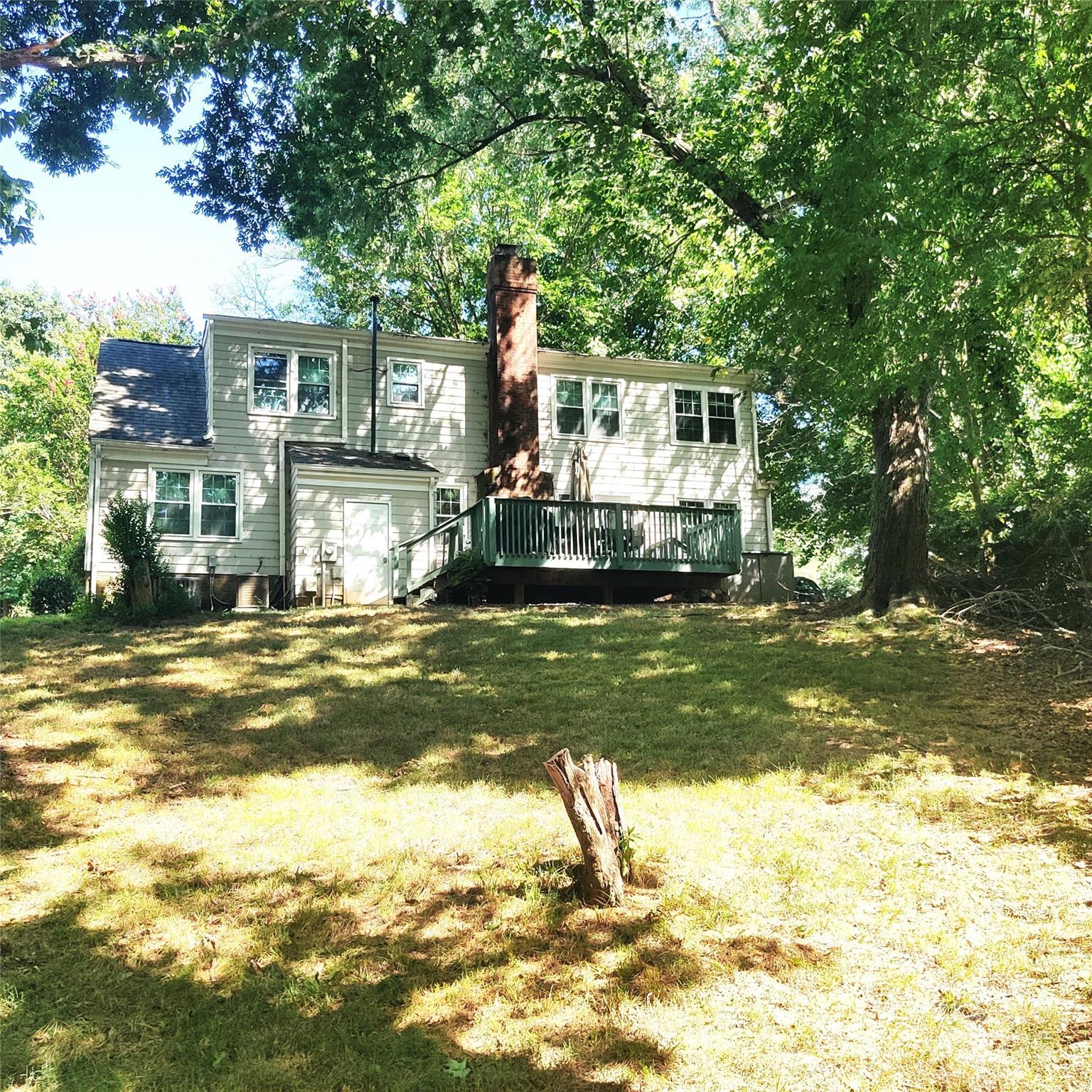 8644 Kirchenbaum Drive Charlotte, NC 28210 - Photo 27 of 28 a front view of a house with a yard