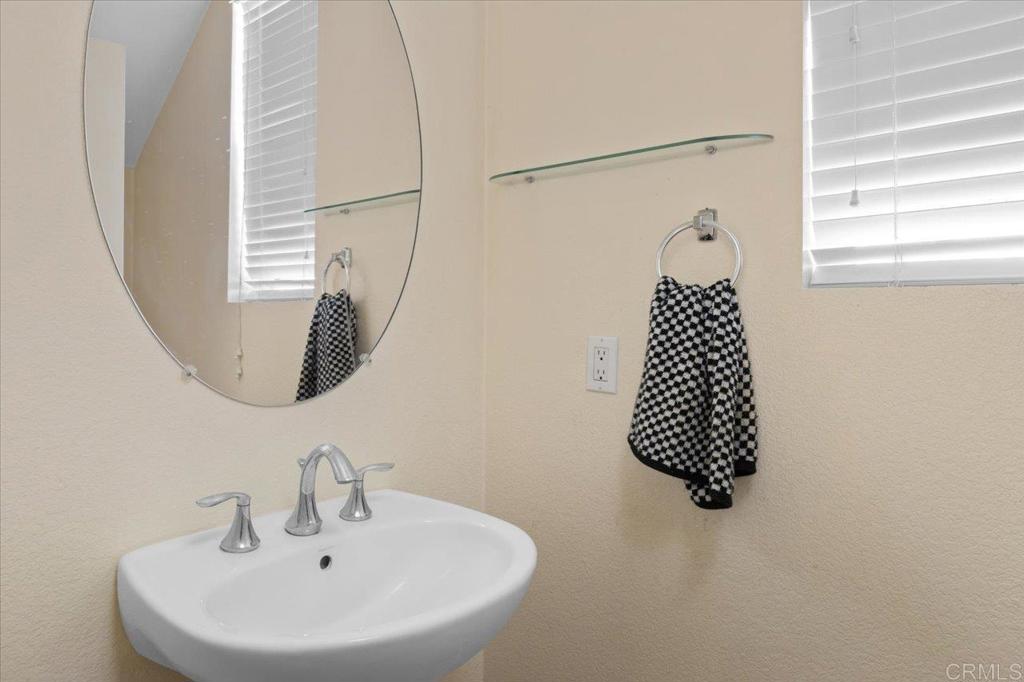 4163 Lake Cir Drive Fallbrook, CA 92028 - Photo 16 of 34 a bathroom with a sink and a window
