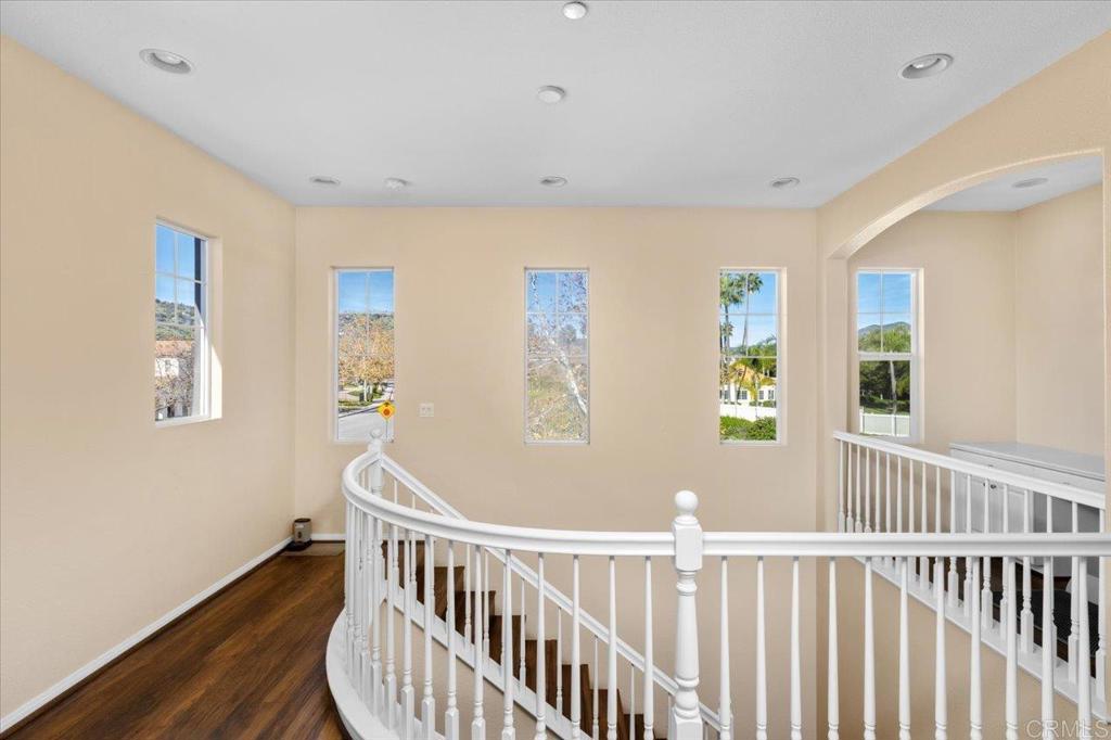 4163 Lake Cir Drive Fallbrook, CA 92028 - Photo 17 of 34 a view of a bedroom with wooden floor