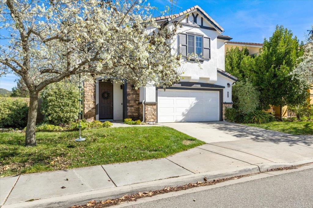 4163 Lake Cir Drive Fallbrook, CA 92028 - Photo 2 of 34 front view of a house with a yard