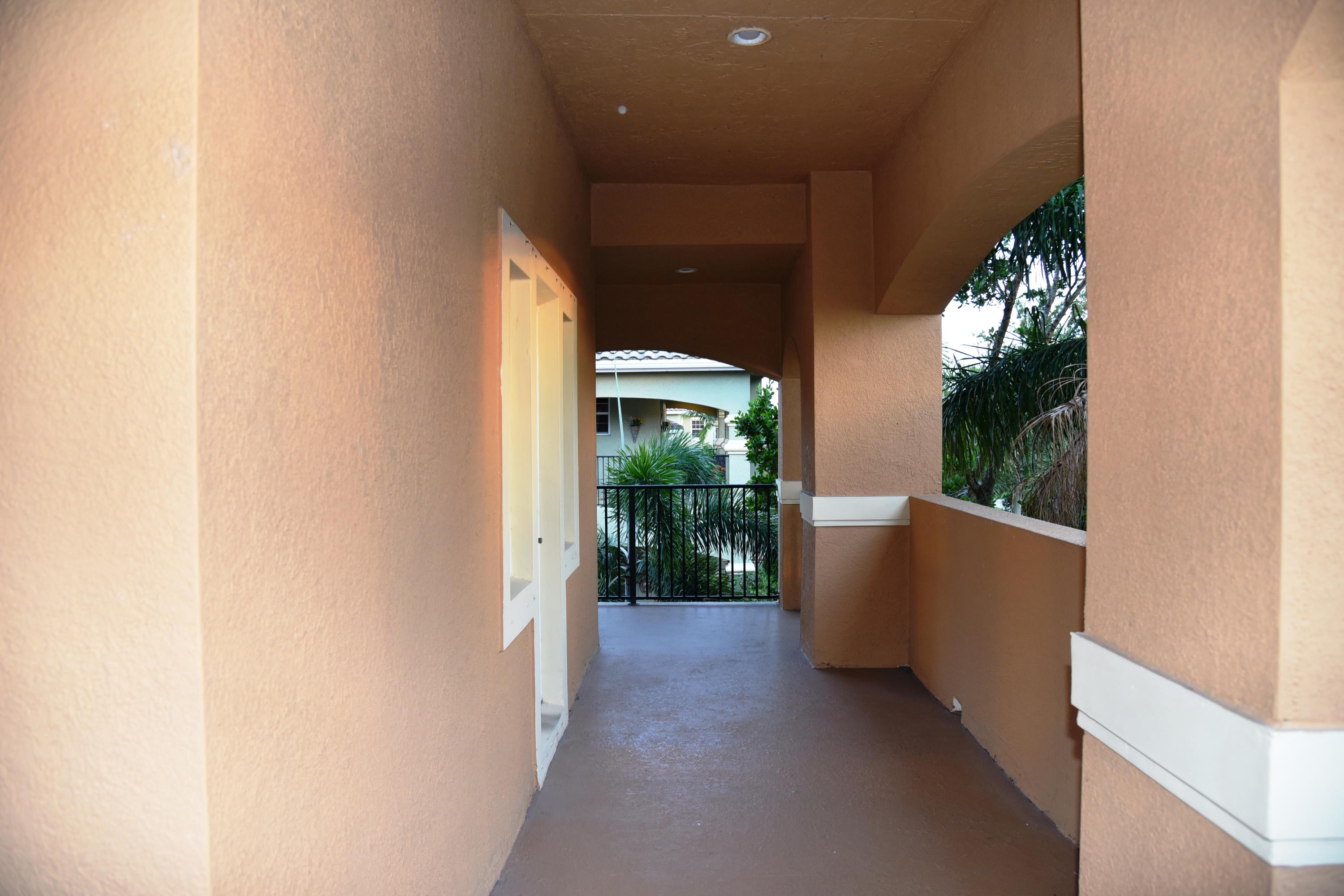 443 Cresta Circle West Palm Beach, FL 33413 - Photo 17 of 22 Front Balcony